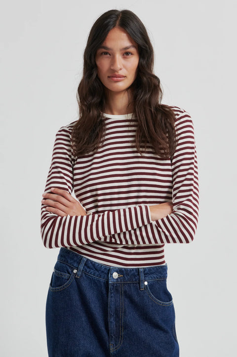100% cotton, round neck, and long sleeve with twin needle stitching, in brown and white stripe.