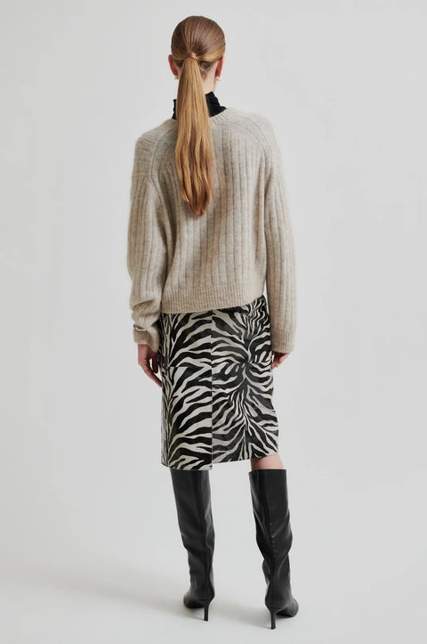 Mohair and wool blend sweater, soft and stretchy, classic fit relaxed with a wide rib fabric. V neck long sleeve sweater in beige. Second female brand.