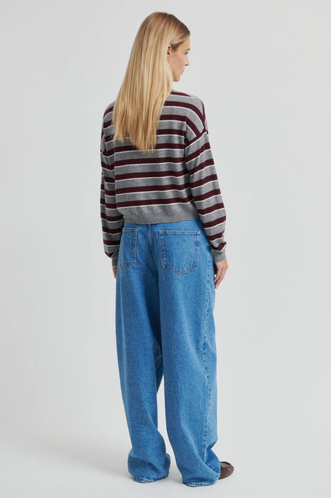 Classic rugby shirt, with boxy stripe grey and brown. Merino blend with a polo collar, half-button placket, and ribbing at the collar, cuffs, and hem. Cut short but not cropped, in a slightly relaxed fit.