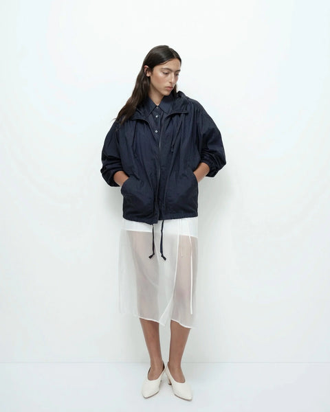 Navy anorak jacket full outfit styled lightweight spring outerwear