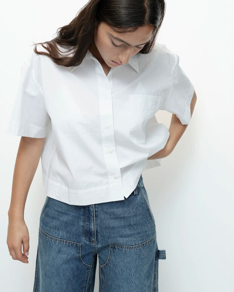 White cotton shirt angled front view cropped length relaxed fit