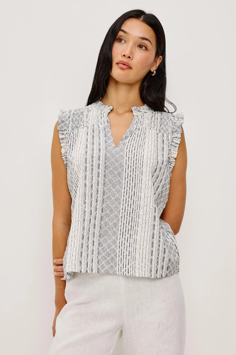 Striped eyelet linen top angled front view relaxed summer fit