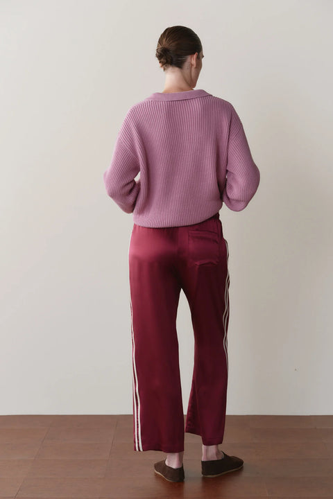 DONNI Silk Stripe Oxblood Pant - Side View Highlighting Fluid Drape of 100% Silk Charmeuse