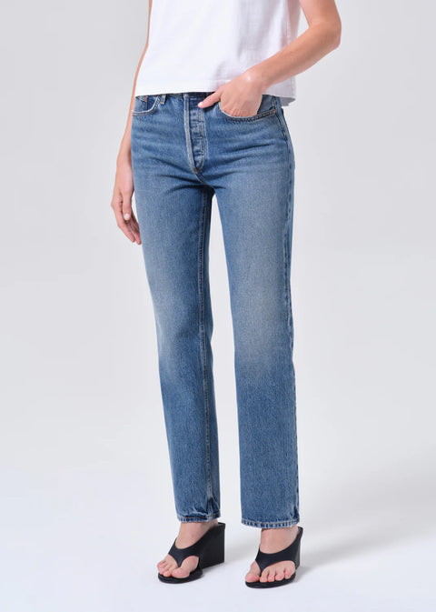 AGOLDE Lana relaxed straight leg jean in Liberty, a medium tinted indigo wash crafted from non-stretch regenerative cotton denim.