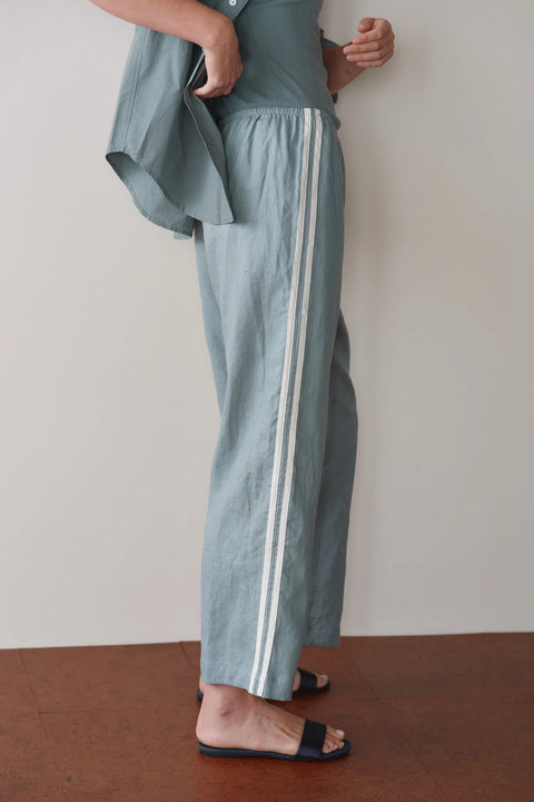 DONNI The Linen Crop Racer Stripe Pant in Sage Green – wide-leg cropped 100% linen pants with racer stripes and elasticated waistband, made in Los Angeles