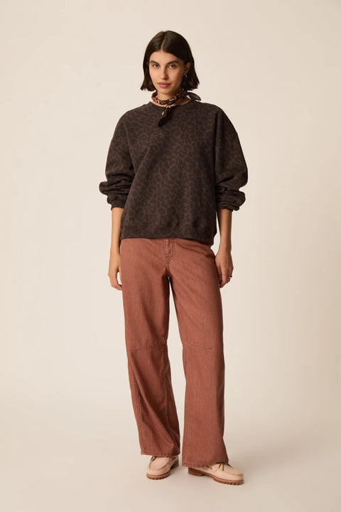 Des Petits Hauts Jacinthe Leopard Sweatshirt - Styled Shot with Jeans Showing Casual Everyday Look