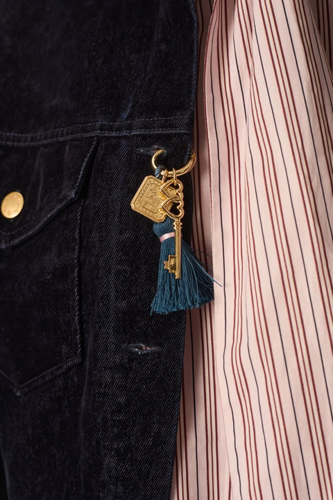 Des Petits Hauts Paolino Bag Charm - Close-Up of Tassel, Double-Heart Key Charm and Engraved Gold Plaque Detail