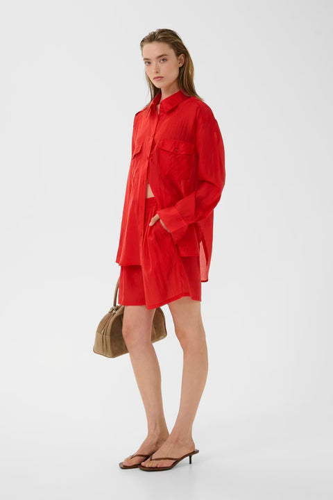 Gestuz Siora Shirt Tomato Red - Side View Highlighting Sheer Lyocell Fabric and Long Sleeves