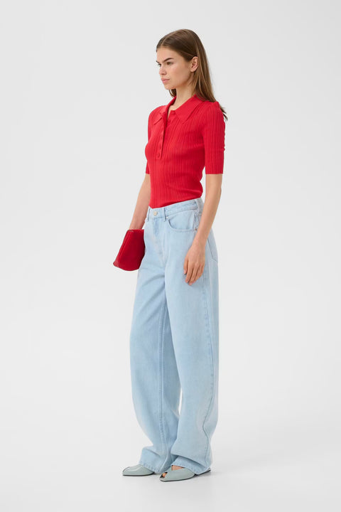 Gestuz Clene Polo Shirt in Tomato Red – women's ribbed polo with classic fit, pointed collar, button placket and elbow-length sleeves in a bold tomato red