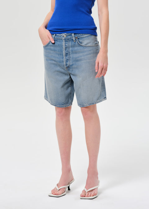 AGOLDE Indra Flyweight Short Reset - Front View of Women's Baggy Lyocell Recycled Cotton Denim Short with Wide Leg Opening