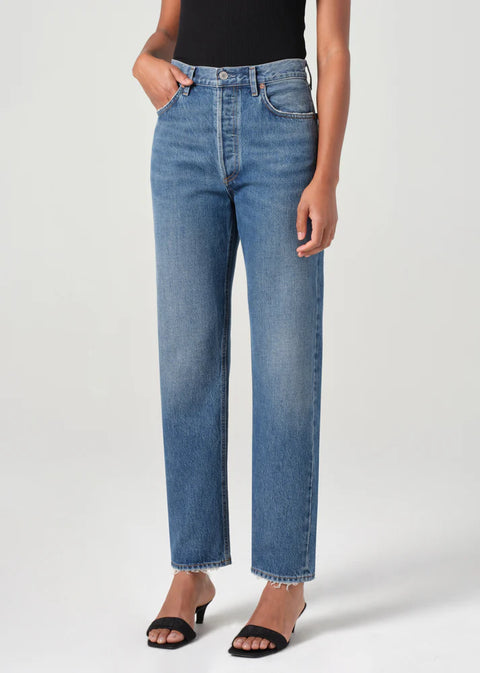AGOLDE 90s high-rise pinch waist straight jeans in faded indigo on model