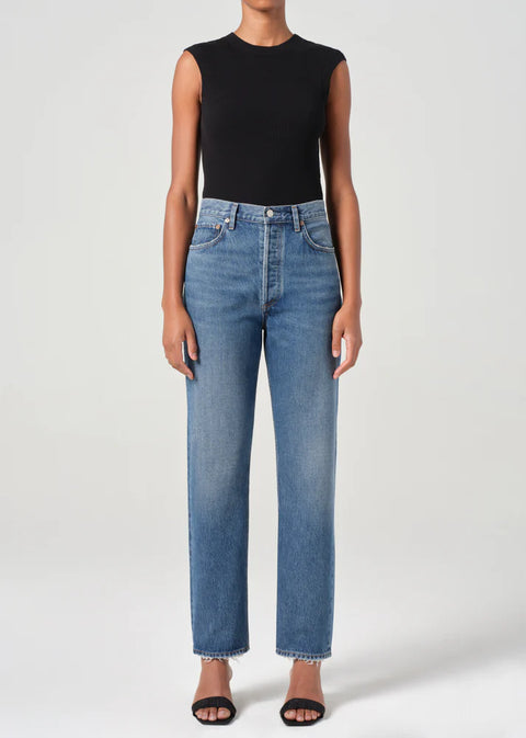 AGOLDE 90s high-rise pinch waist straight jeans in faded indigo on model