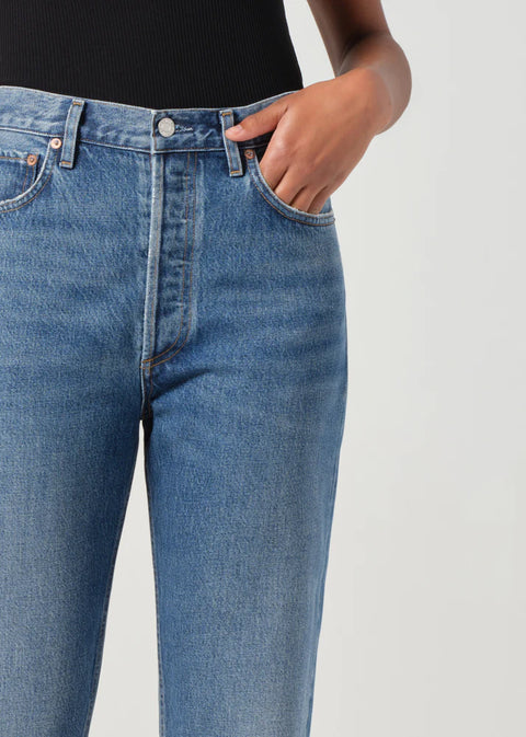 AGOLDE 90s high-rise pinch waist straight jeans in faded indigo on model