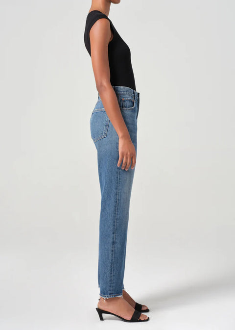 AGOLDE 90s high-rise pinch waist straight jeans in faded indigo on model