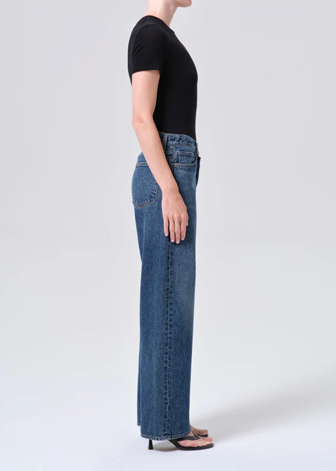 dark indigo denim with criss Cross waistband and curved leg shape
