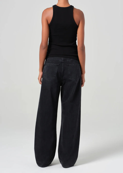mid-rise fit black denim with a subtle, curved outseam that gently tapers for a flattering silhouette. 
