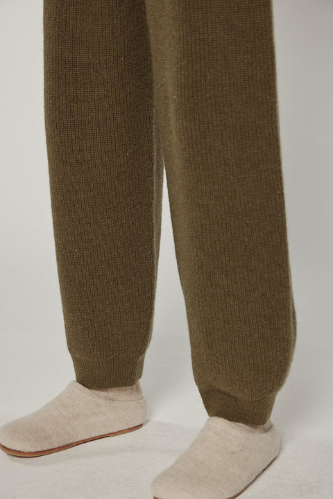 Amente cashmere wool ribbed sweater pants in dark olive on model