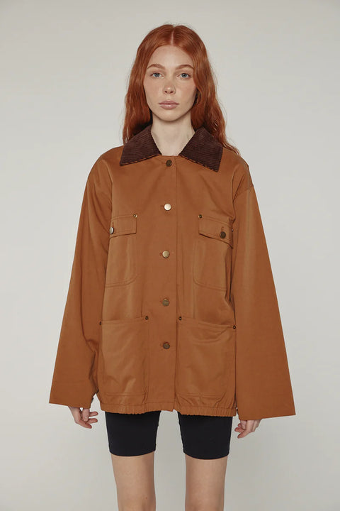 Durable cotton jacket, worker jacket style with buttons down the front, boxy fit, patch pockets, 100% cotton. Amente Cotton Worker Jacket in Brown
