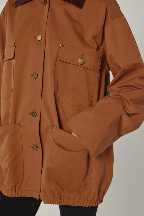 Durable cotton jacket, worker jacket style with buttons down the front, boxy fit, patch pockets, 100% cotton. Amente Cotton Worker Jacket in Brown
