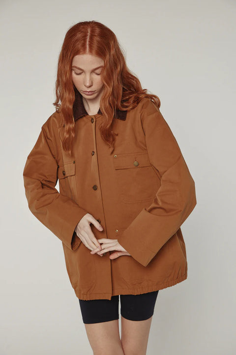 Durable cotton jacket, worker jacket style with buttons down the front, boxy fit, patch pockets, 100% cotton. Amente Cotton Worker Jacket in Brown
