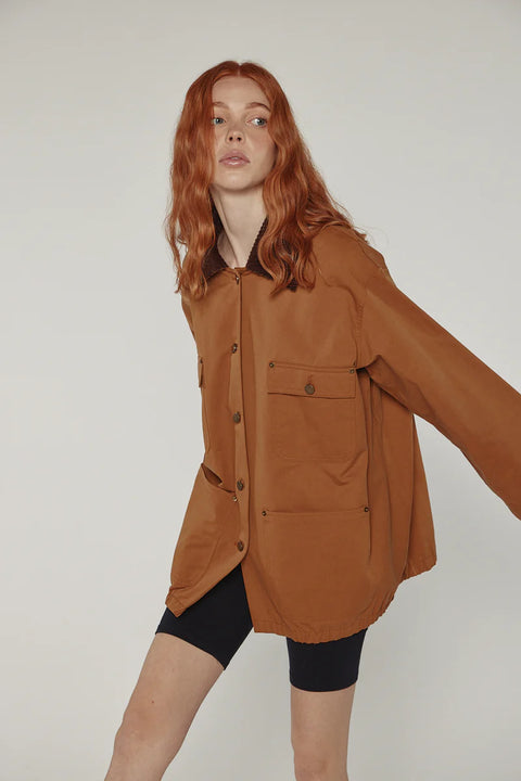 Durable cotton jacket, worker jacket style with buttons down the front, boxy fit, patch pockets, 100% cotton. Amente Cotton Worker Jacket in Brown
