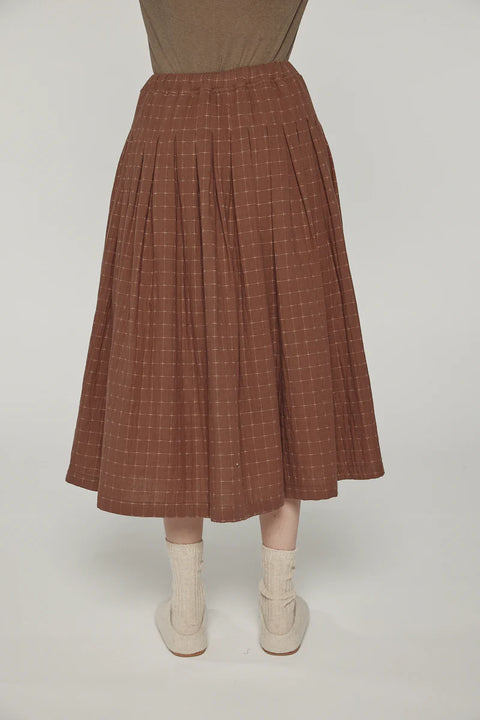 wide-leg pants with tie waist made from cotton linen blend, straight leg fit.  brown and black pattern. Amente Pleated Waist Tie Skirt in Brown
