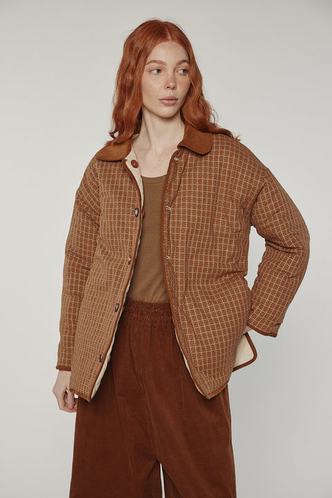 Amente reversible quilted jacket in sand with mocha grid reverse