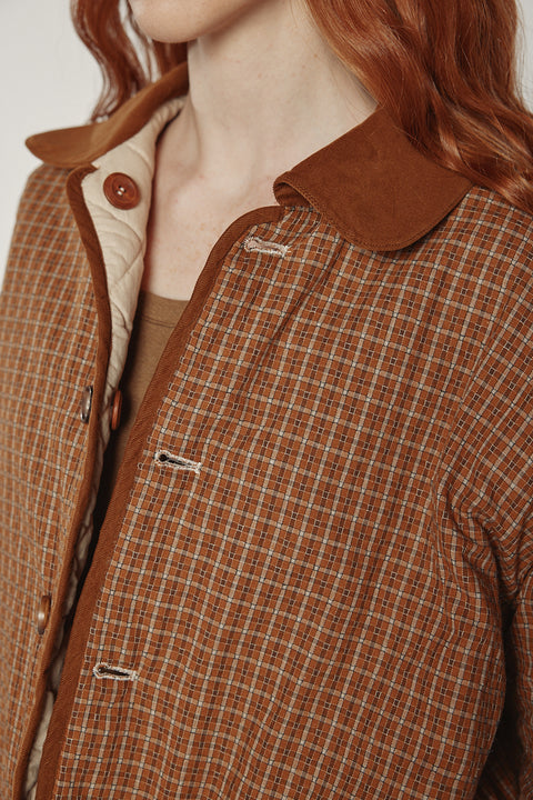 Amente reversible quilted jacket in sand with mocha grid reverse