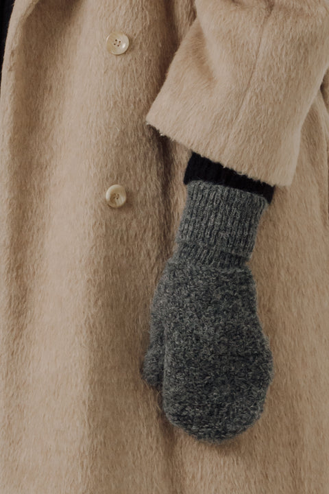 Textured boucle yarn mittens/gloves, with a ribbed cuff, brand is bare knitwear. Available in beige , grey and black
