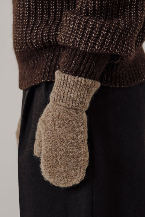 Textured boucle yarn mittens/gloves, with a ribbed cuff, brand is bare knitwear. Available in beige , grey and black
