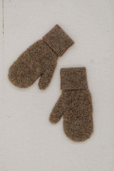 Textured boucle yarn mittens/gloves, with a ribbed cuff, brand is bare knitwear. Available in beige , grey and black
