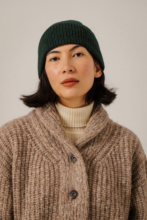 Bare Knitwear Baby Alpaca Rib Beanie - Styled Shot Worn with Coat Showing Turn-Up Cuff Detail