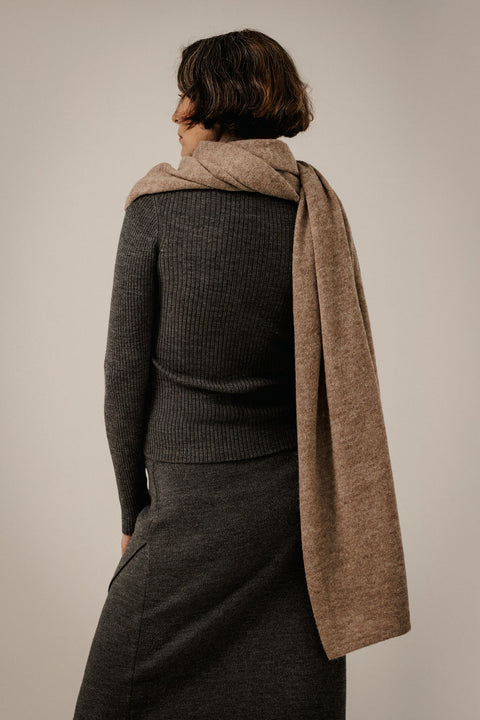 Bare Knitwear Baby Alpaca Travel Wrap - Styled as Lap Blanket Showing Oversized Packable Versatility