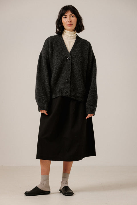 Bare Knitwear Oversized Cardigan Basalt - Side View Highlighting Intentional Oversized Volume and Substantial Baby Alpaca Merino Knit