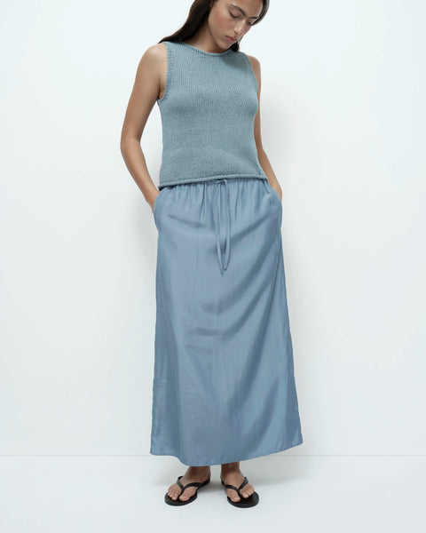 Blue boat neck knit tank side view lightweight fabric