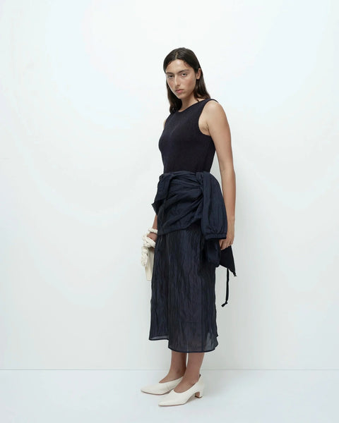 Navy boat neck knit tank angled side view clean silhouette