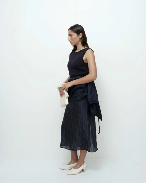 Navy knit tank side view relaxed fit lightweight fabric