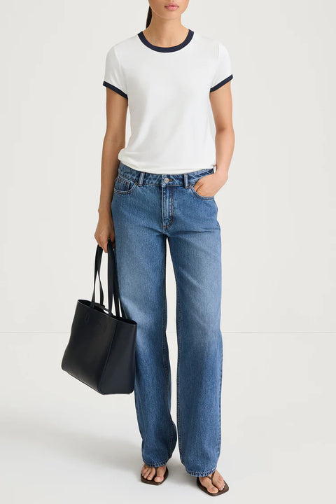 White tee with navy trim, jersey, short sleeve 
