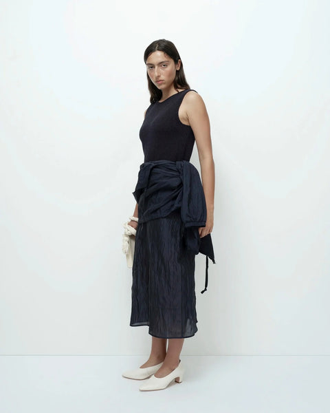 Navy crinkled midi skirt front standing view relaxed silhouette
