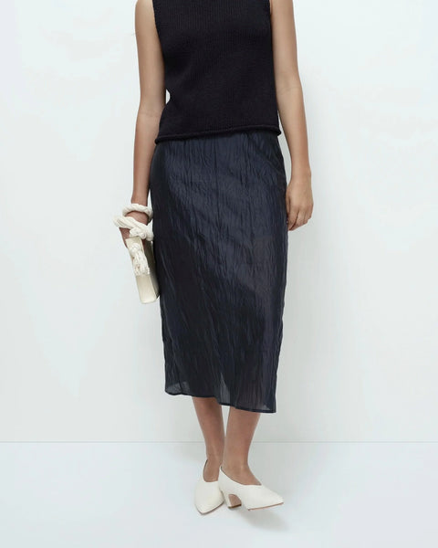 Navy crinkled midi skirt front view textured fabric model