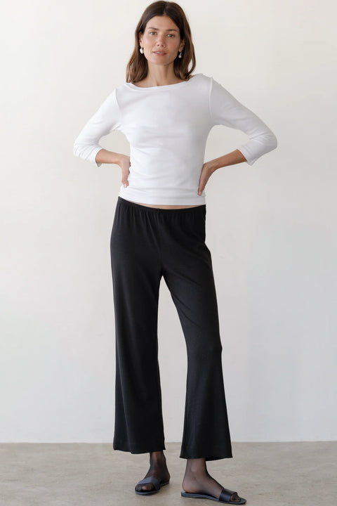 DONNI Baby Rib Scallop Jet Pant - Side View Highlighting Cropped Straight Leg Silhouette in Ribbed Knit