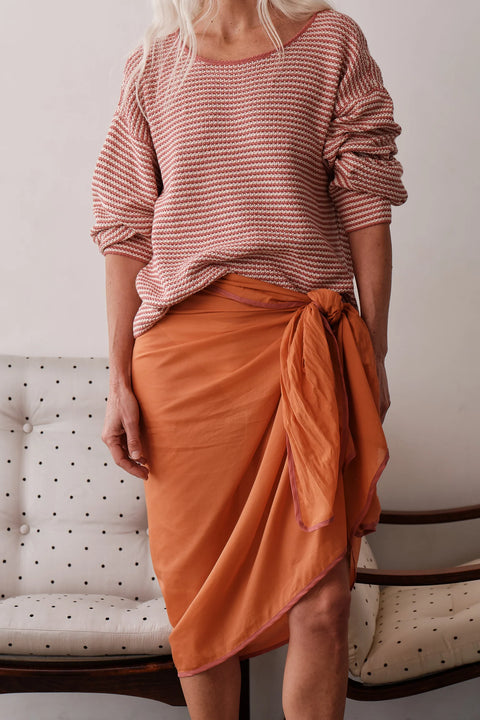 DONNI Cotton Knit Sweater Rhubarb with Creme - Side View Highlighting Dropped Shoulder and Relaxed Silhouette