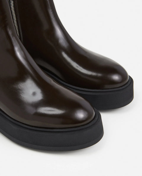 Leather platform boot with rubber sole, side zipper in chocolate brown made by Flattered 