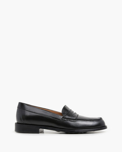Flattered Sage Black Loafer - Lifestyle Shot Showing Versatile Women's Spanish-Made Classic Cow Leather Penny Loafer