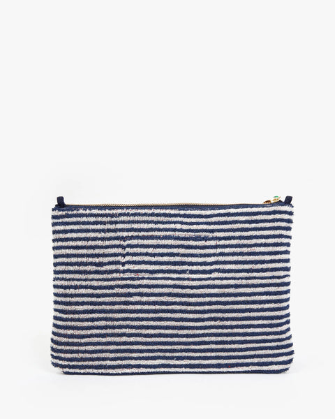 Clare V Flat Clutch in Deep Dive with Cream A La Plage - Styled Summer Beach Shot of Terry Cloth Wristlet Clutch