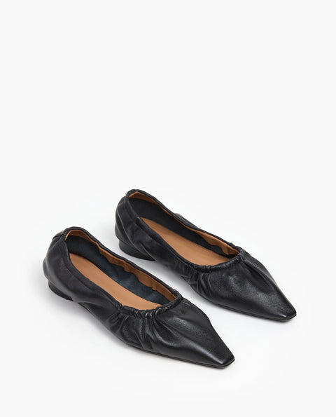 Pointed toe with flat end leather ballet flat, allover-ruched ballet flat sits low for a sleek silhouette and all-day comfort. goat leather and finished with a minimal 6mm heel
