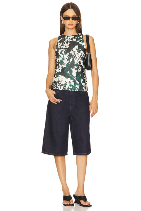 Sleeveless top with subtly flared hem, crewneck, back zip. Pattern green and white
