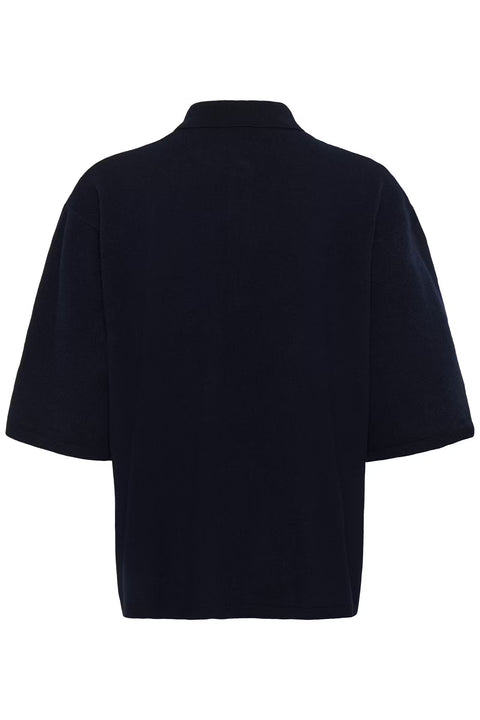 Black wool knit polo shirt with a boxy silhouette, dropped shoulders, five-button placket, and elbow-length wide sleeves.

