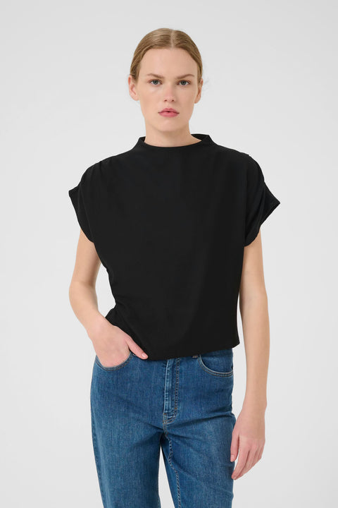 Classic minimalist cream mock neck top with cap sleeves. structured fabric. 
