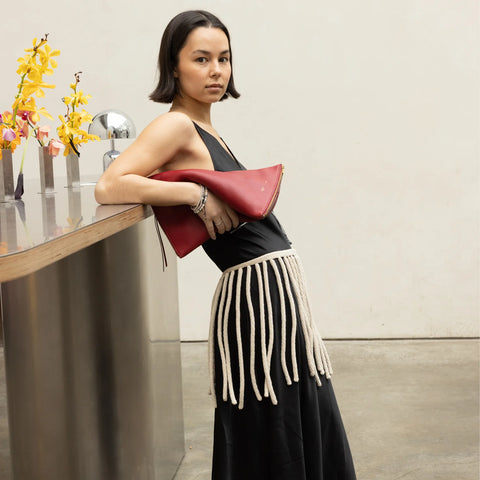 Hand crocheted fringe skirt with adjustable tie closure

